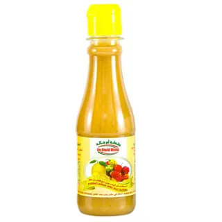 Um Khalid Mixing Pickled Lemon with Hot Chilies 250 Gm