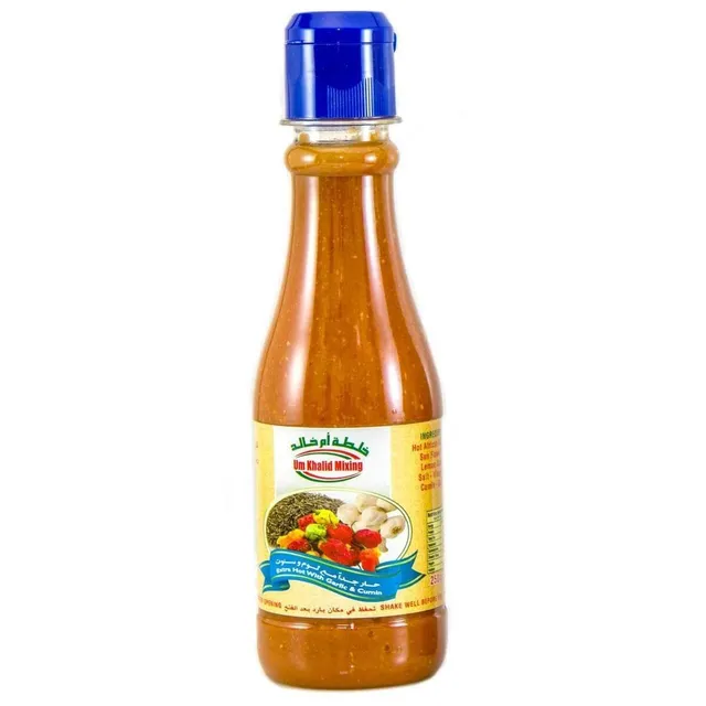 Um Khalid Mixing Chili Paste With Garlic And Cumin 250 Grams